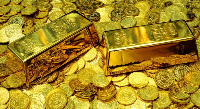 Sztabki złota i złote monety
