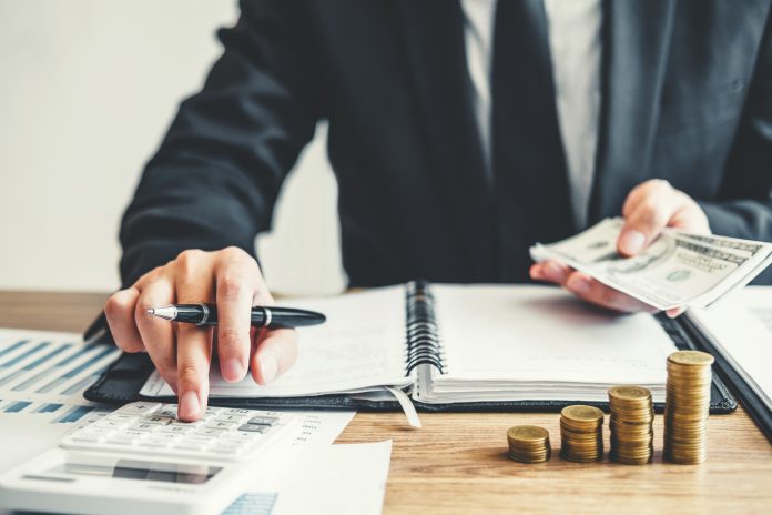 Business man Accounting Calculating Cost Economic budget investm pożyczki ratalne