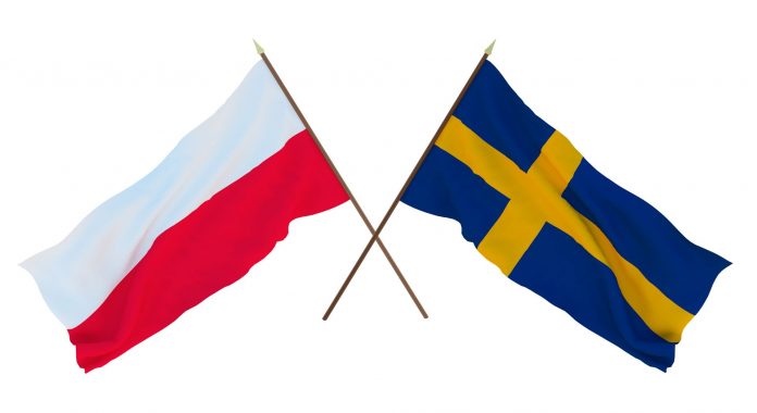 Flagi Szwecji i Polski